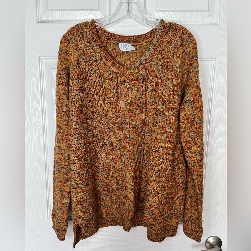 Women’s multi color sweater.